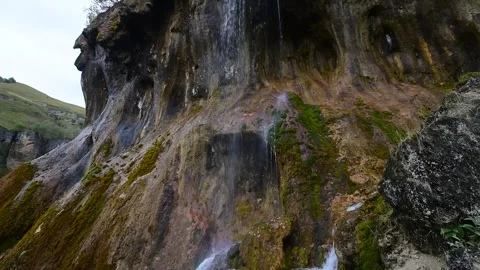 Waterfall on colored rocks Stock Footage 277127819
