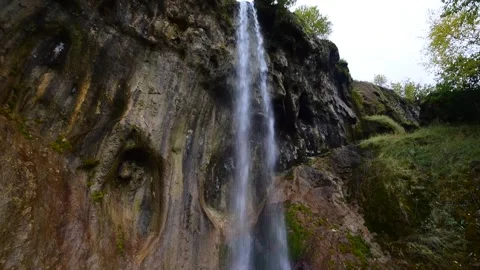 Waterfall on colored rocks Stock Footage 277127820