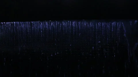 Waterfall with Coloured Lights In Background Stock-Footage 1086338