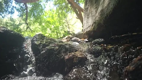 Waterfall of cool clear drinking water macro, slow motion Stock Footage 241100272