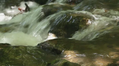 Waterfall on creek in high mountains Stock Footage 35914045