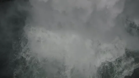 Waterfall crushing the cliffs version 1 Stock Footage 255293816