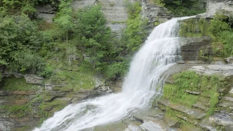 Waterfall Cuts Through a Rocky Gorge Stock Footage 81499088