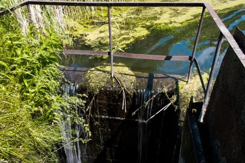 Waterfall from the dam Stock Photos