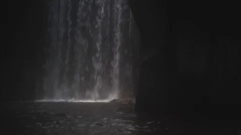 Waterfall in dark cave Stock Footage 89817519