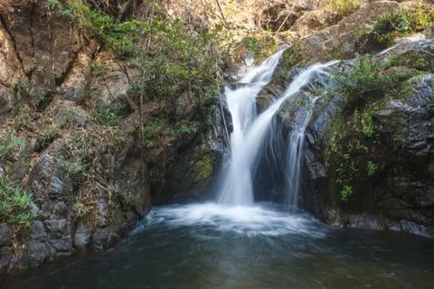 Waterfall in the deep forest on mountain 스톡 사진