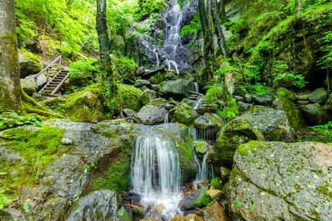 Waterfall in deep forest Stock Photos