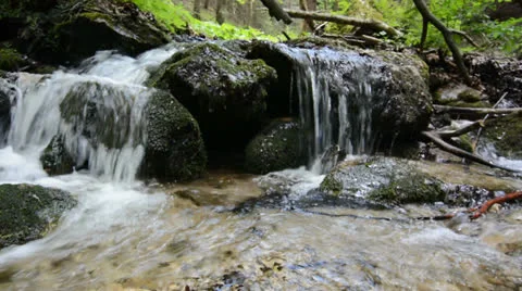 Waterfall in the deep forest by summer Stock Footage 25915364