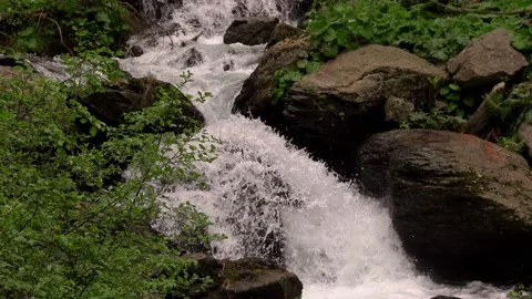 Waterfall deep into the mountains Stock Footage 132956199