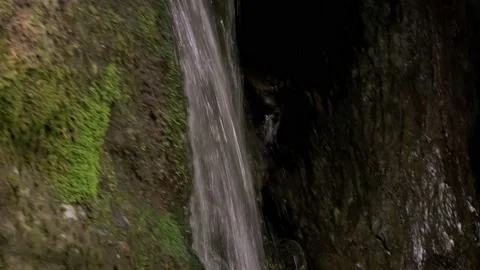 Waterfall deep into the mountains Stock Footage 132956769
