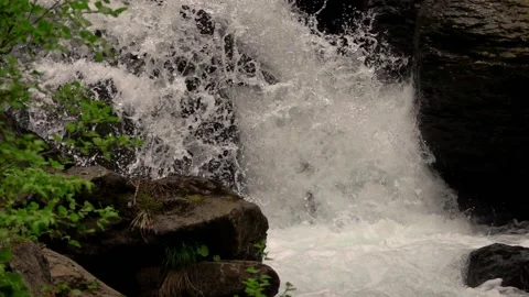 Waterfall deep into the mountains in slow motion Stock Footage 132958285