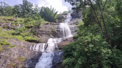 This waterfall descends over rocky mountain terraces Stock Footage 340267152