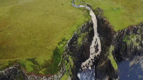 Waterfall that directly empty into the sea Stock Footage 122237795