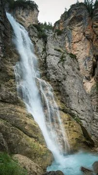 Waterfall in the Dolomite Mountains Stock Photos
