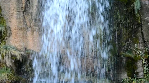 Waterfall down a Limestone Cliff, Detail Zoom Out Stock-Footage 32233524