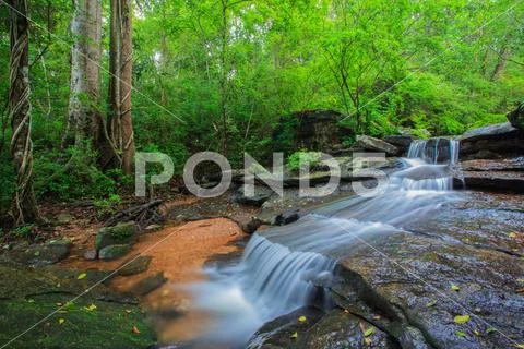 Waterfall in early spring Stock Photos