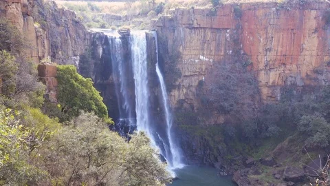 Waterfall on the Elands River cascading over vertical cliff face South Africa Stock Footage 81416319