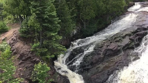 Waterfall Emerging from North Woods 스톡 동영상 79112603