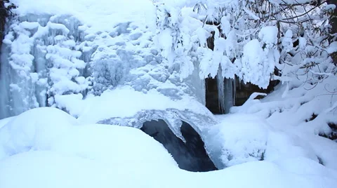 Waterfall encased in ice Stock Footage 35543882