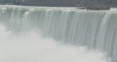 Waterfall ending in a large cloud of mist, Niagara Falls (no color grade) Stock Footage 293087749