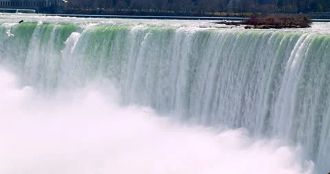 Waterfall ending in a large cloud of mist, Niagara Falls, slow motion Stock Footage 293088517