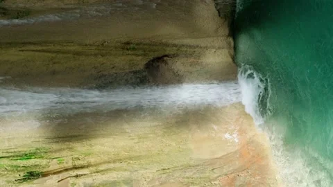 Waterfall ending up in natural pool with emerald water Stock Footage 158332983