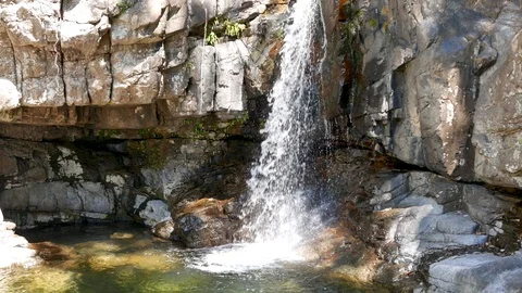 Waterfall ends in a pond Stock Footage 119161627