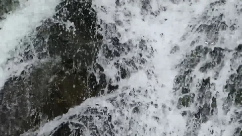 Waterfall falling from mountain Stock Footage 97925501