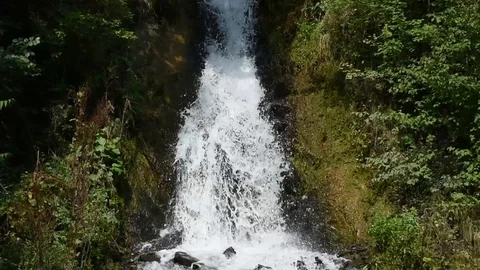 Waterfall falling from mountain Stock Footage