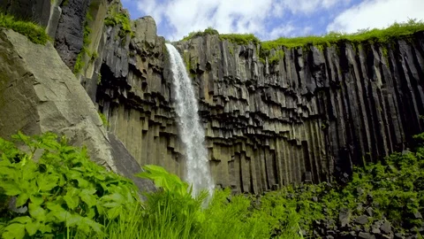 Waterfall falling over the basalt columns Stock Footage 73011621