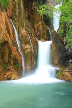 Waterfall falling to river Stock Photos