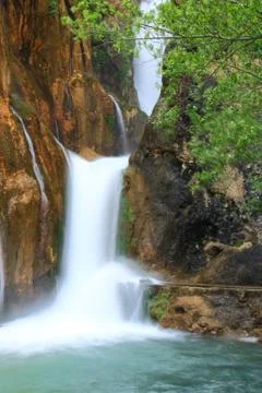 Waterfall falling to river Stock Photos