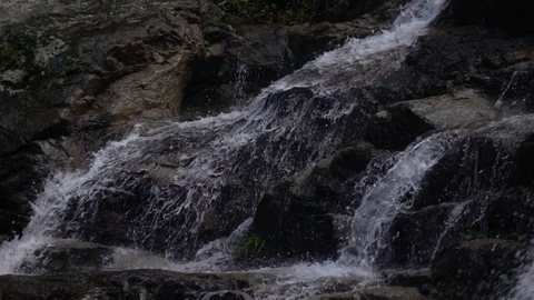 Waterfall falling on rock slow motion Stock Footage 77006988