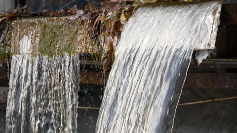 Waterfall, falling water from rocks Stockbeeldmateriaal 256041984