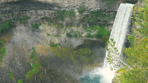 Waterfall falls from cliff Stock Footage 63618492