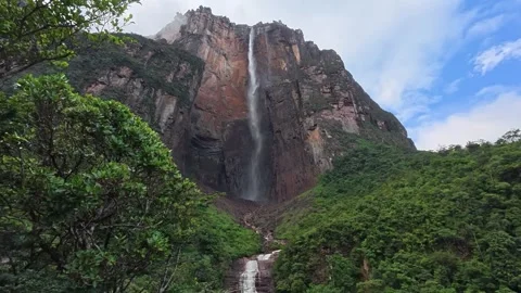 This waterfall falls into a deep forest valley Stock Footage 340266989
