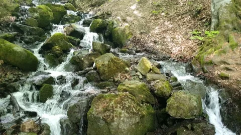 Waterfall, fast flowing water from rocks 3 Stock Footage 195957040