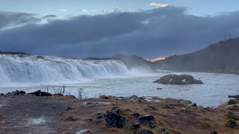 Waterfall Faxi at Winter Sunset with Cloudy Sky, Iceland. Stock Footage 327672956