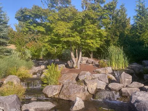 Waterfall feature at park Stock Photos