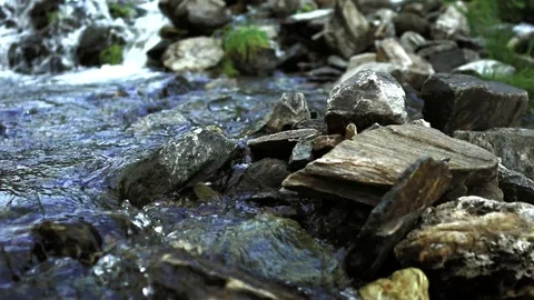 Waterfall Floating Through An Idyllic Landscape In The Alps Stockbeeldmateriaal 115119590