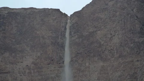 Waterfall flood in the desert Stock Footage 168327340