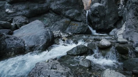Waterfall flow in mountains Stock Footage 57763828