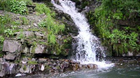 Waterfall, the flow of water in the mountain river Stock Footage 37706004