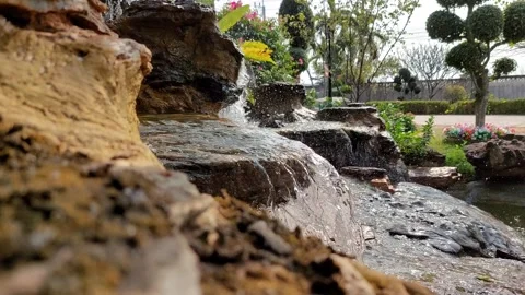 Waterfall flowing and splashing Stockbeeldmateriaal 263519167