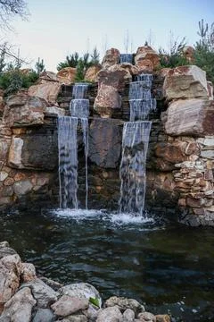 Waterfall flowing down from a cliff close-up. vertical photo Stock-Fotos