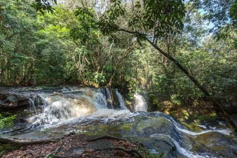 Waterfall flowing down rocks into the Amazon River in Brazil, South America Stock Photos