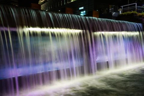 A waterfall flowing at night Stock-Fotos