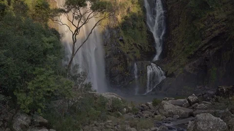 Waterfall flowing into the Oribi Gorge Stock Footage 114745767