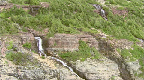 Waterfall Flowing Over Mountains Stock Footage 37427011