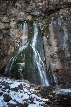 Waterfall flowing over rocks Stock Photos